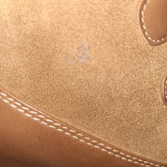 A pair of Ugg Alasdair waterproof Leather/ Sheepskin Wedge Boots size 7