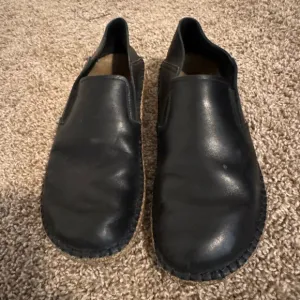 Birkenstock Black Leather Flats Sleek and Comfortable