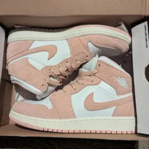 Jordan Pink and White Mid-Top Sneakers
