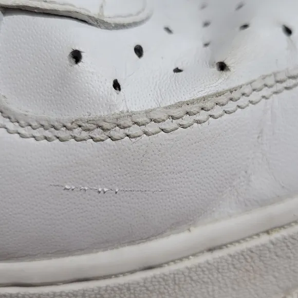 Nike Air Force One mid top basketball shoes