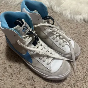 Nike Blazer Mod ‘77 White and Blue High-Top Sneakers