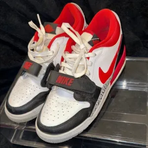 Nike Red and Black Sneakers Classic Low-Top Design