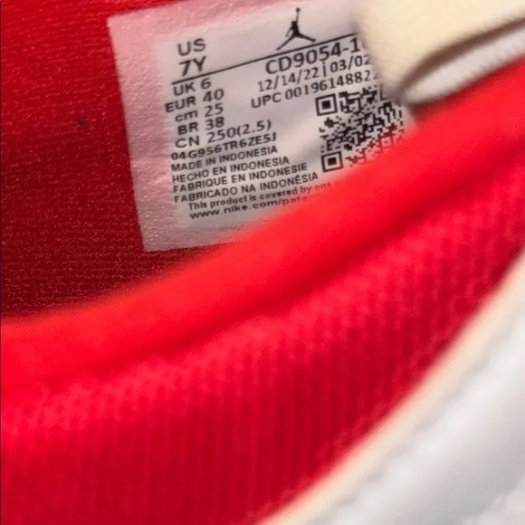 Nike Red and Black Sneakers Classic Low-Top Design