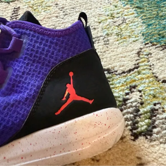 Purple high top NIKE Jordan Reveal basketball shoes