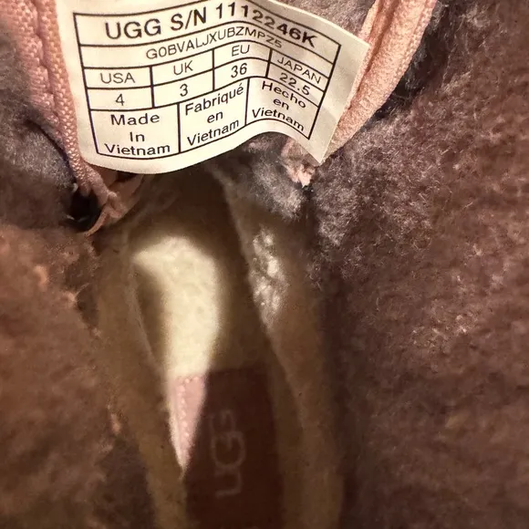 UGG Pink Winter Boots with Lace-Up Front and Sturdy Rubber Sole