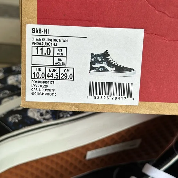 Vans Black and White High-Top Skull Sneakers